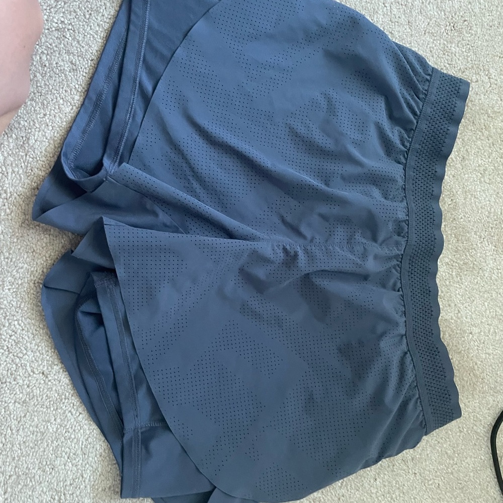 Athletic shorts with biker shorts attached underneath!